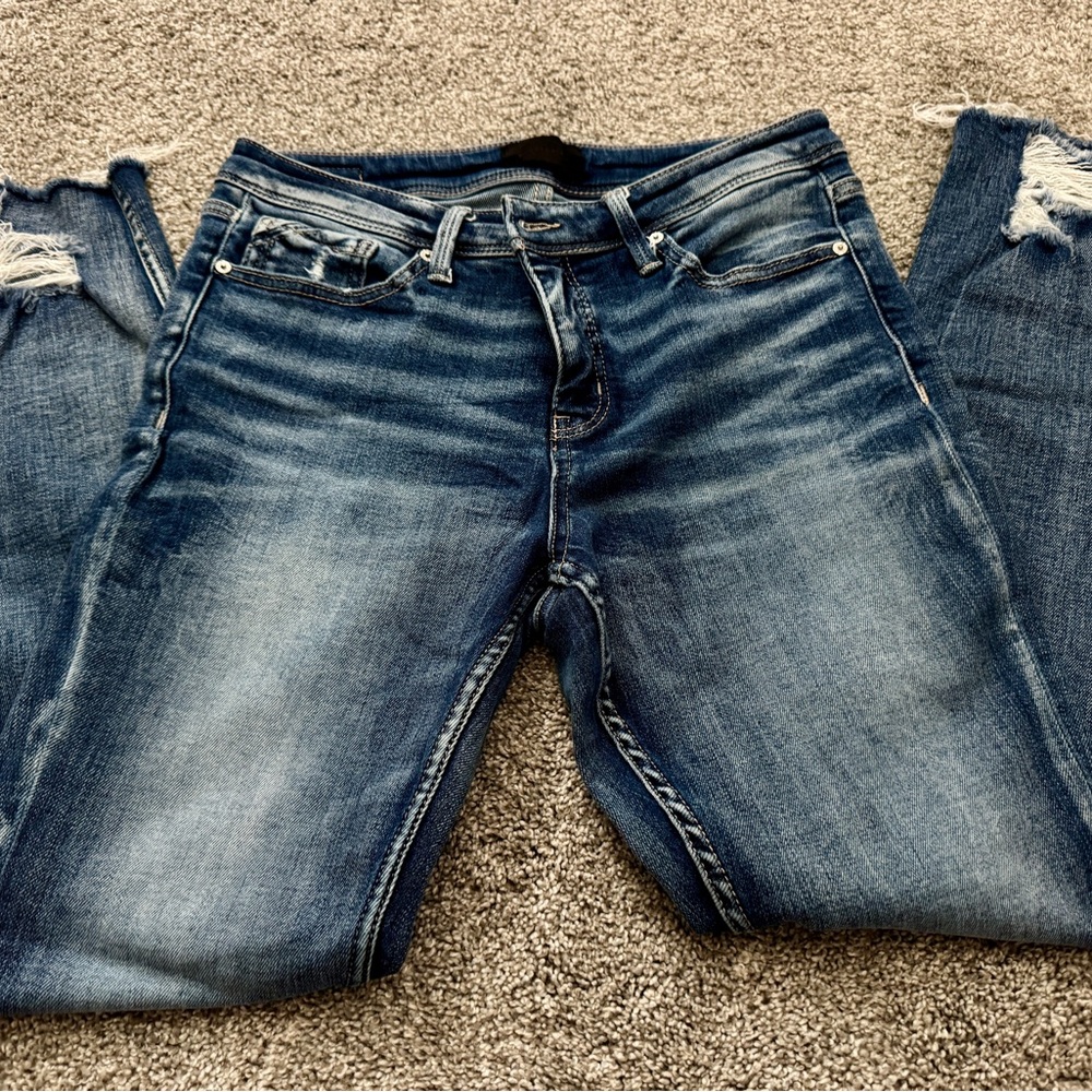 Buckle black skinny jeans